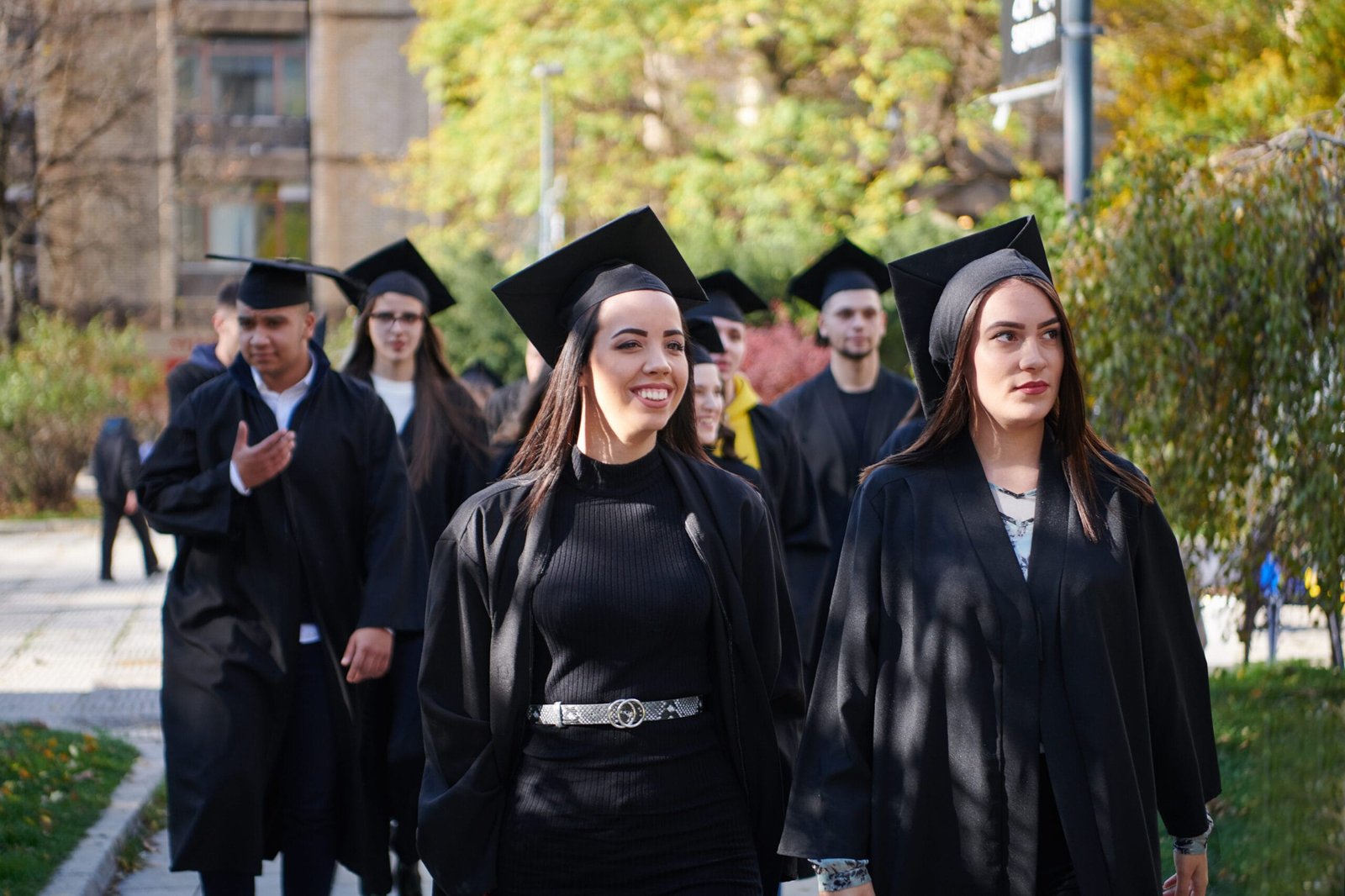 Group of diverse international graduating students celebrating